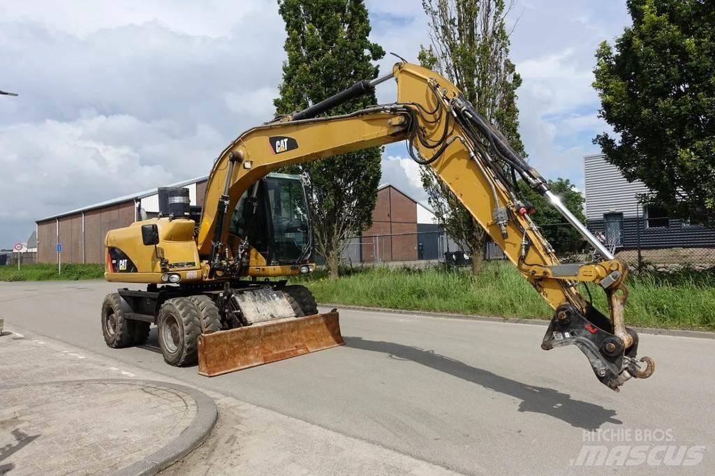 CAT M313 D Ratasekskavaatorid
