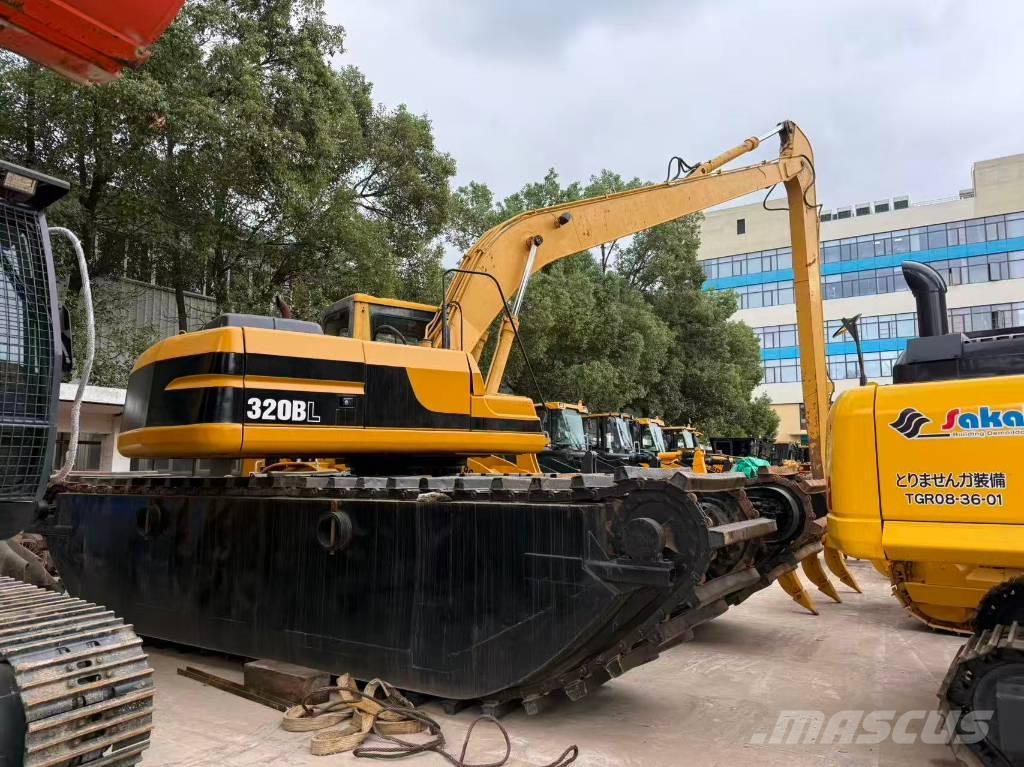 CAT 320BL Amfiib ekskavaatorid