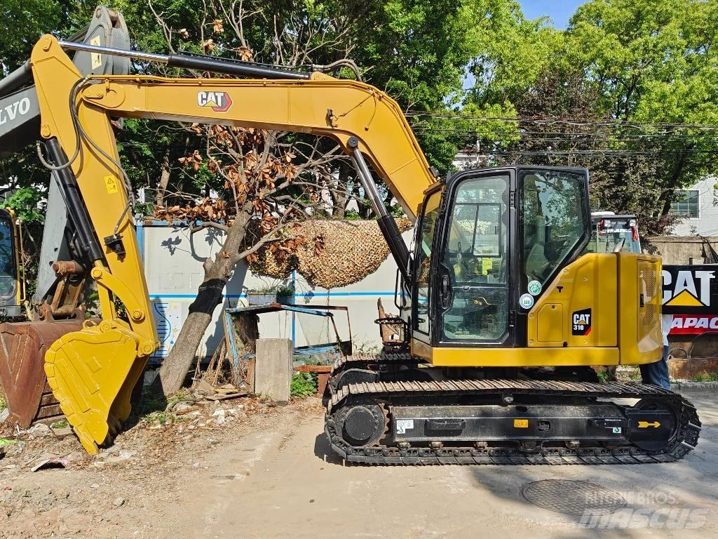 CAT 310 Roomikekskavaatorid
