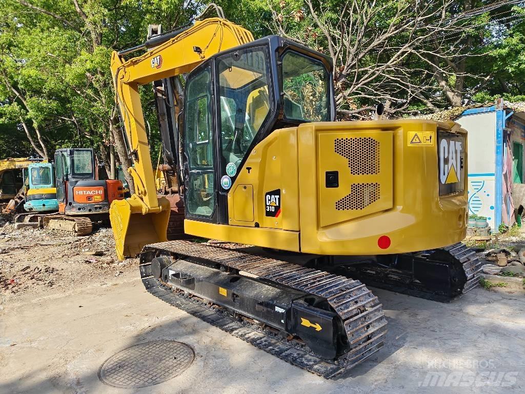 CAT 310 Roomikekskavaatorid
