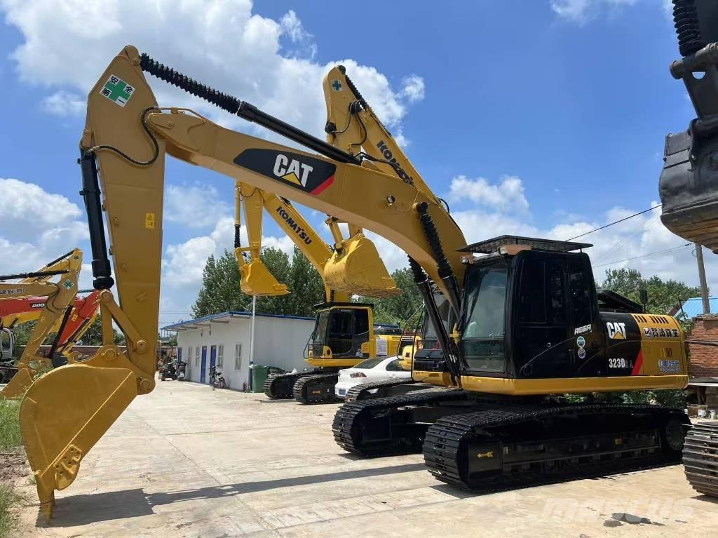 CAT 323DL Roomikekskavaatorid