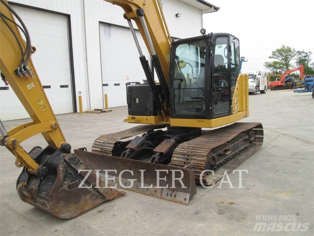 CAT 310 Roomikekskavaatorid