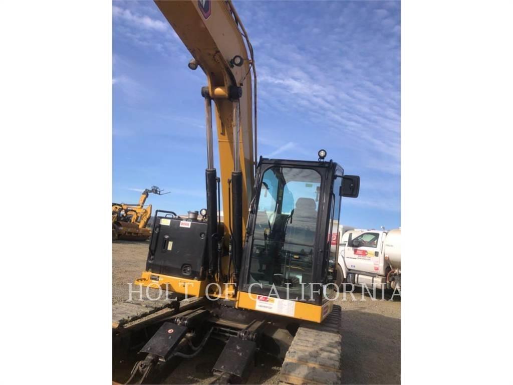 CAT 310 Roomikekskavaatorid