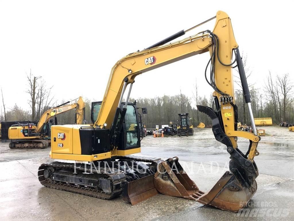 CAT 310-07 Roomikekskavaatorid