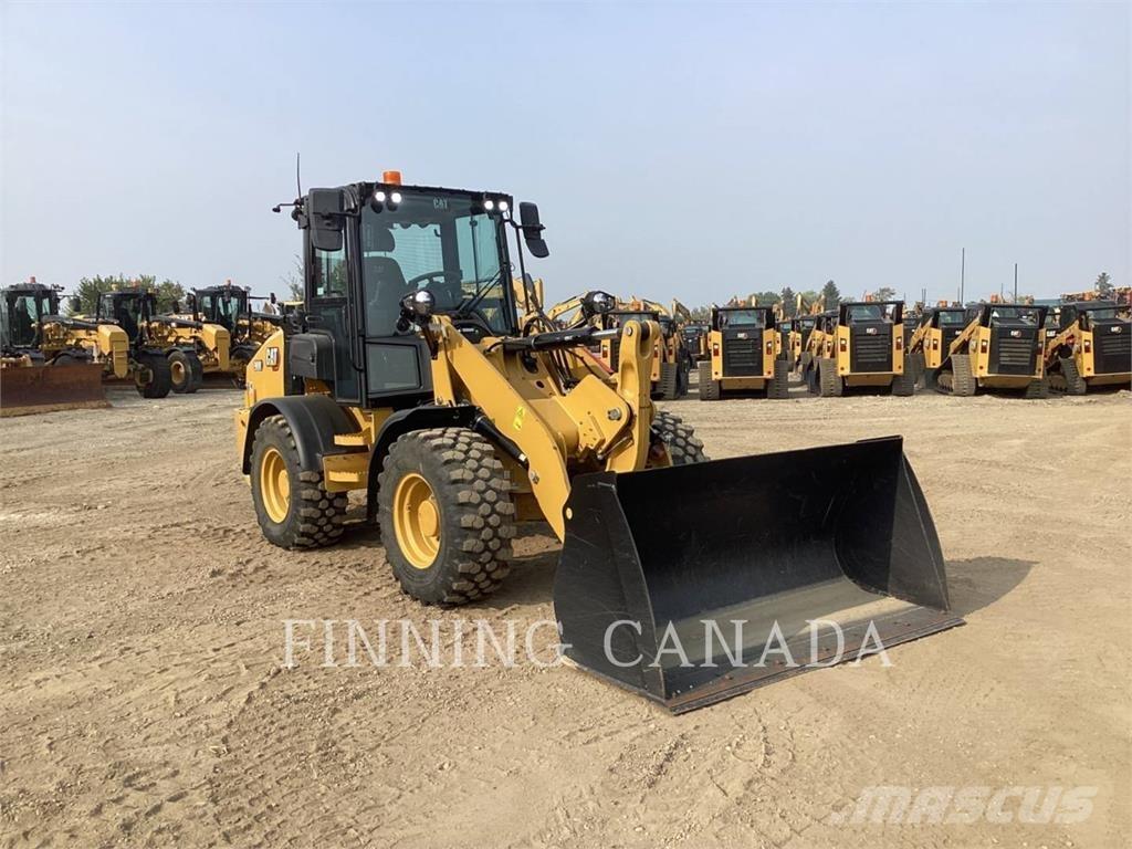 CAT 908 Rataslaadurid