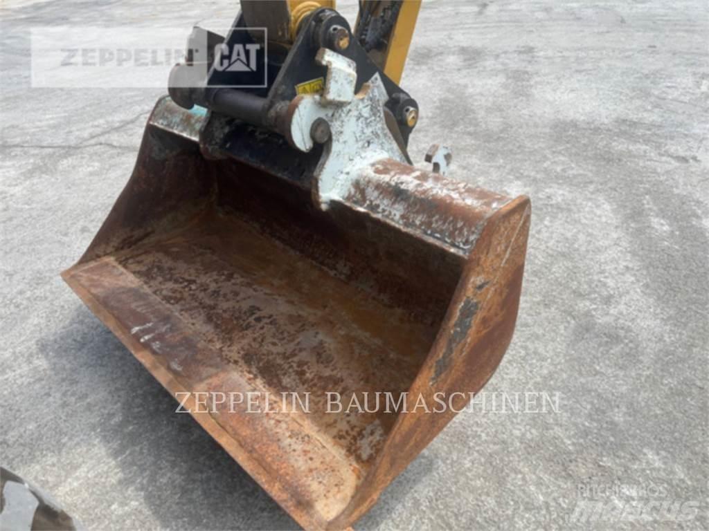 CAT M315-07A Ratasekskavaatorid
