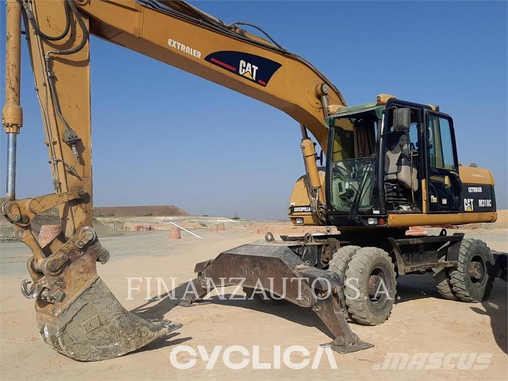 CAT M318 Ratasekskavaatorid