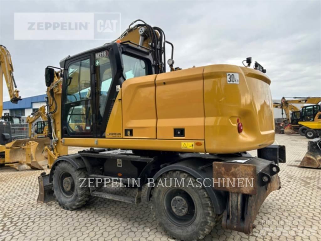 CAT M318-07A Ratasekskavaatorid