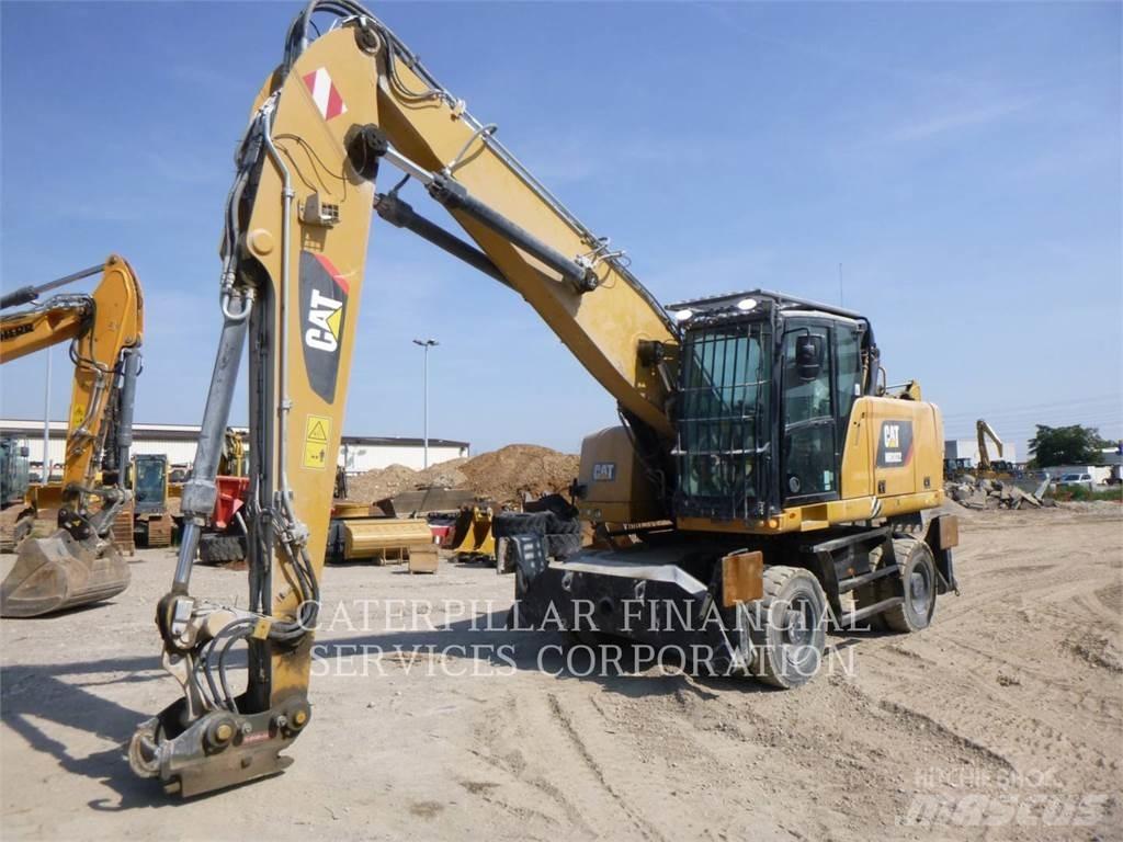 CAT MH3022-06 Ratasekskavaatorid