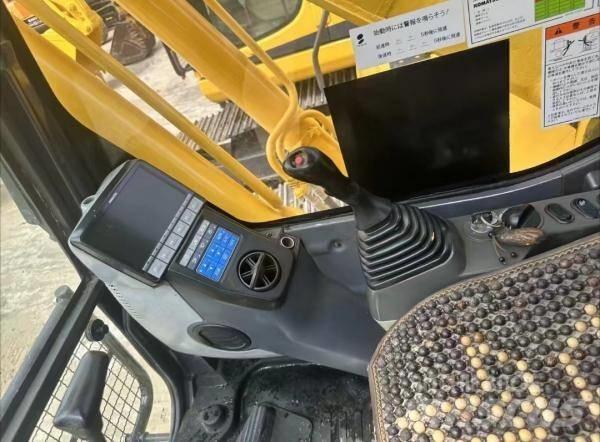 Komatsu PC 200 Väikeekskavaatorid 7t-12t
