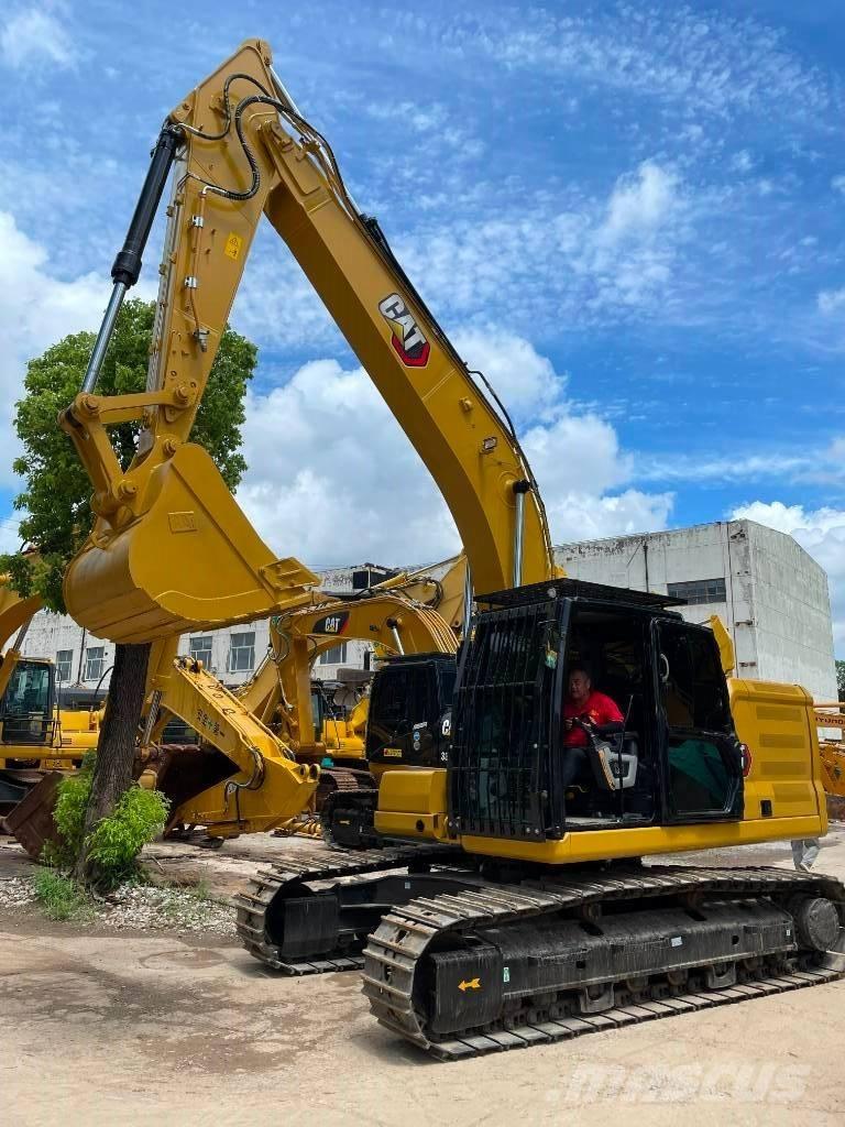 CAT 323 Väikeekskavaatorid 7t-12t