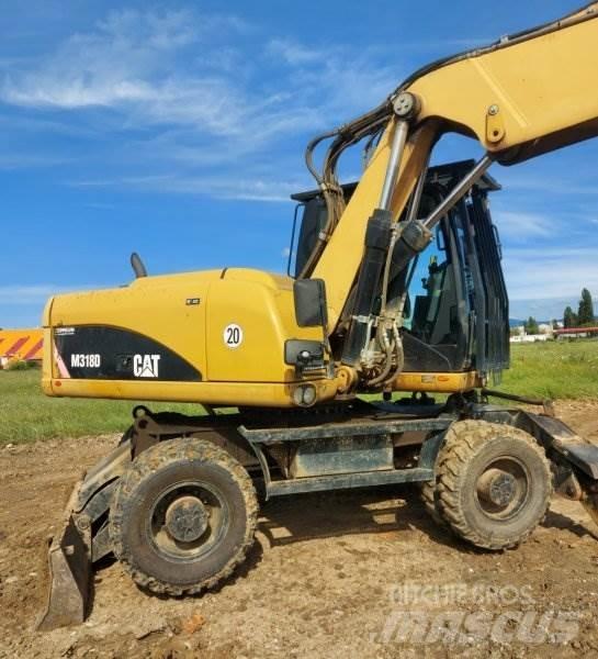 CAT M318 D Ratasekskavaatorid