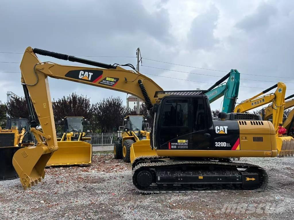 CAT 320 D L Roomikekskavaatorid