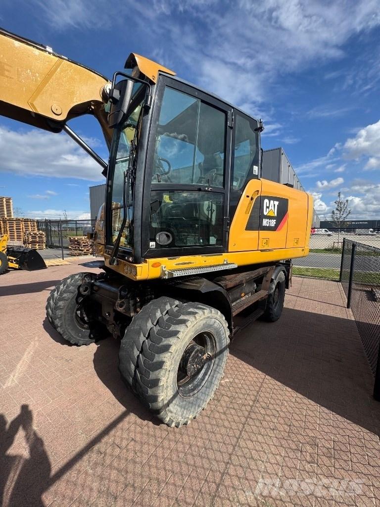 CAT 318 Ratasekskavaatorid