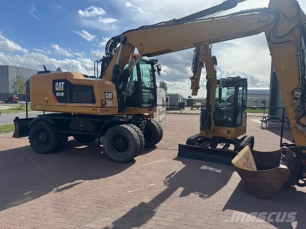 CAT 318 Ratasekskavaatorid
