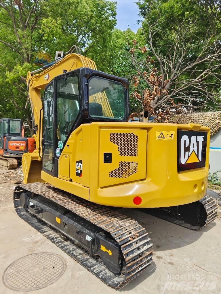 CAT 310 Roomikekskavaatorid