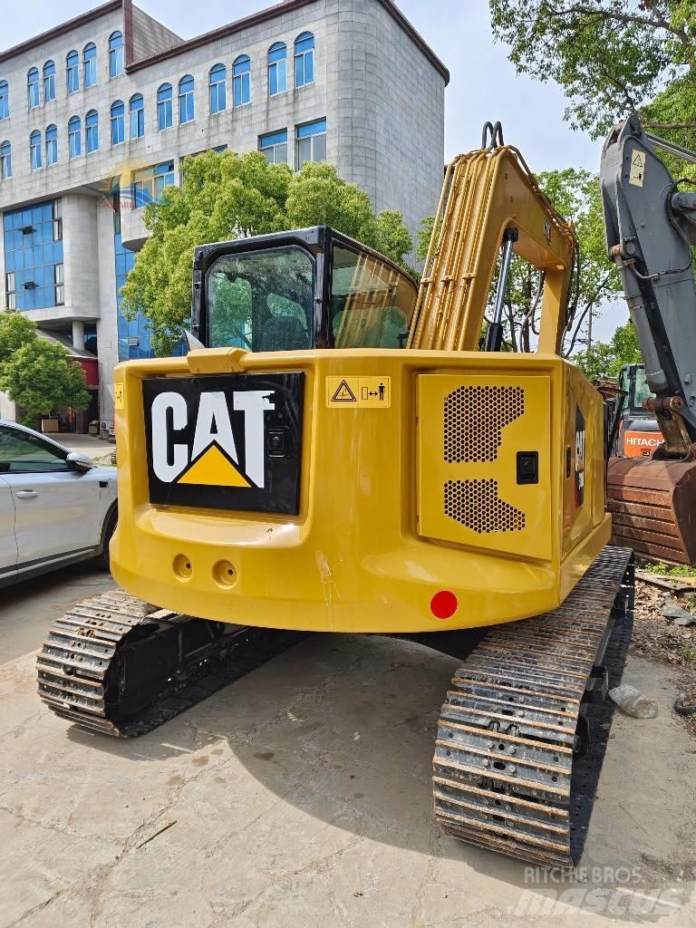 CAT 310 Roomikekskavaatorid