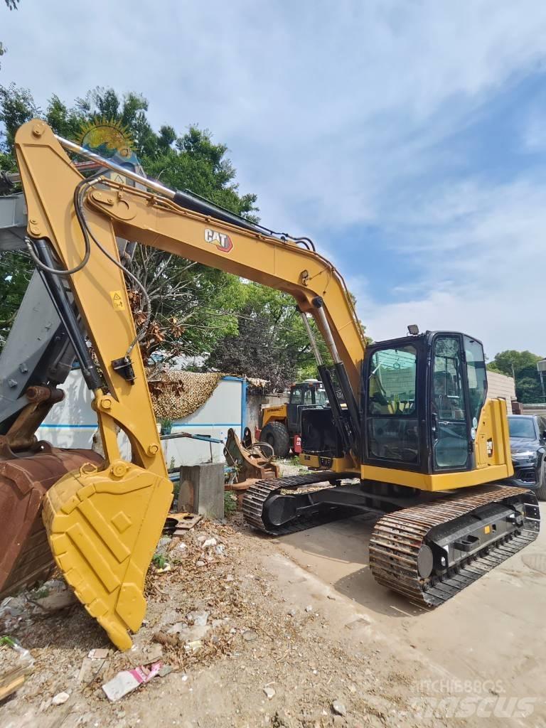 CAT 310 Roomikekskavaatorid