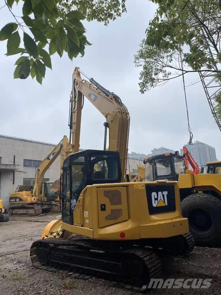 CAT 310 Roomikekskavaatorid