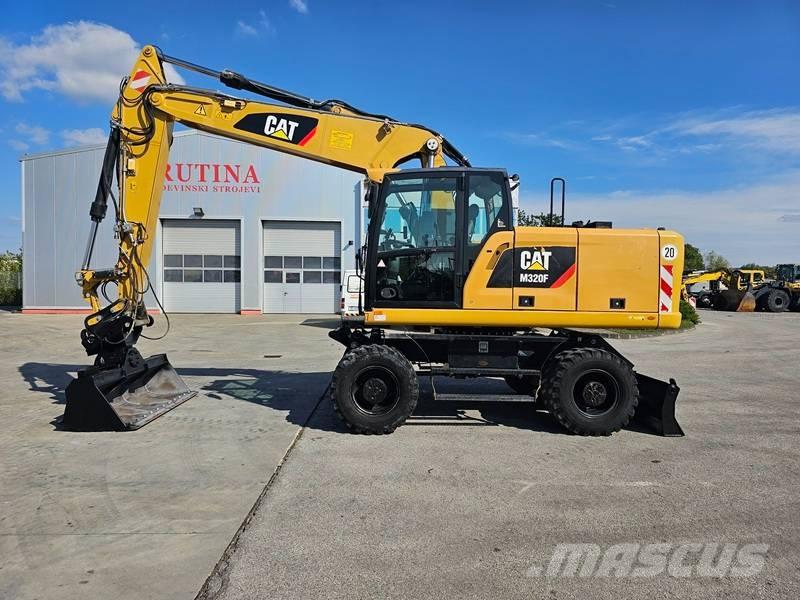 CAT M320F Ratasekskavaatorid