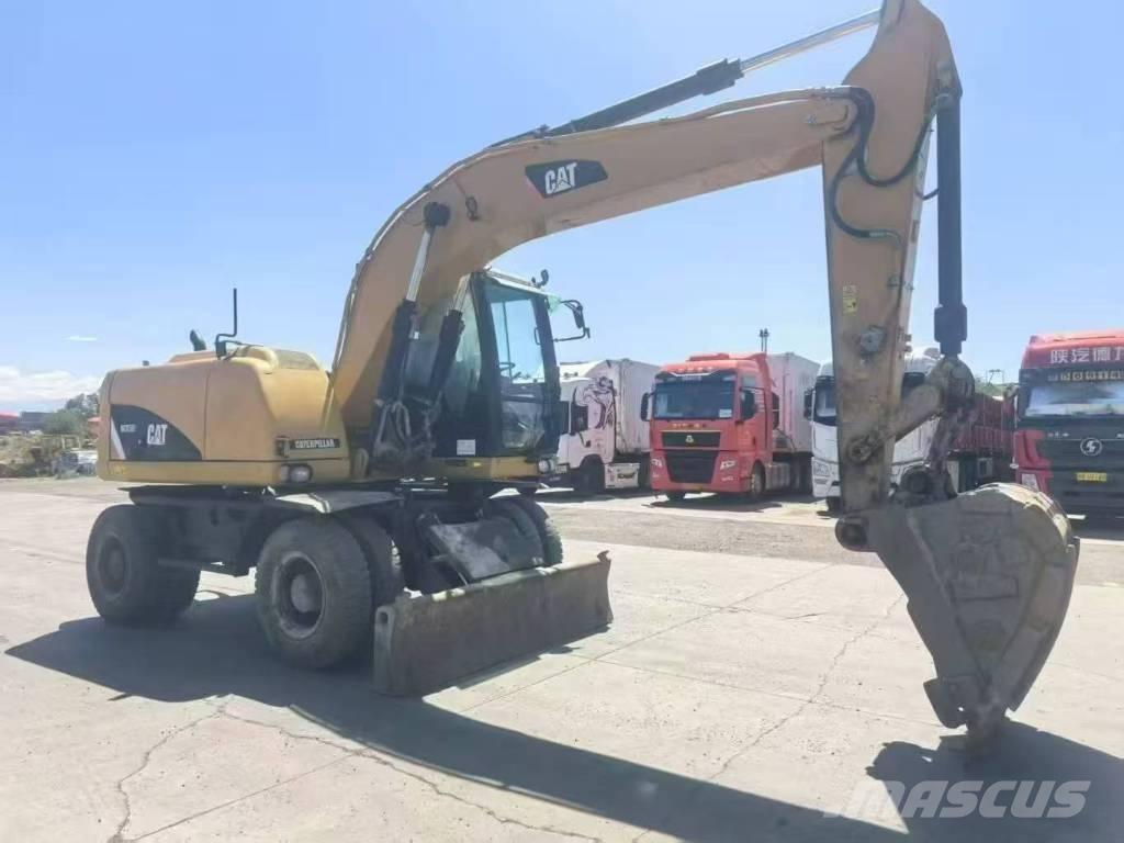 CAT M315D2 Ratasekskavaatorid