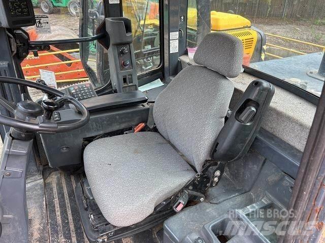 John Deere 544K Rataslaadurid