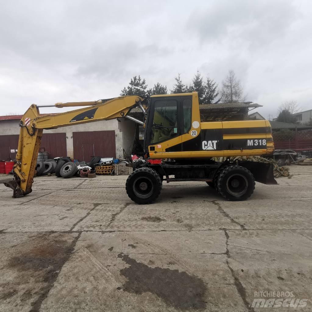 CAT M 318 B Ratasekskavaatorid