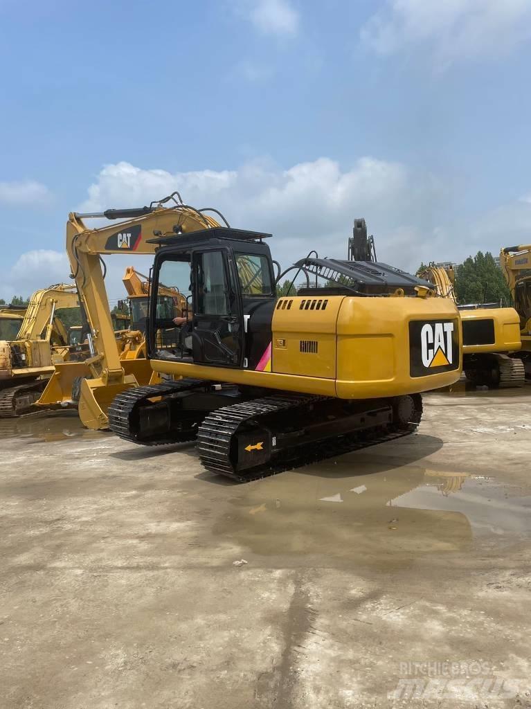CAT 320D Roomikekskavaatorid