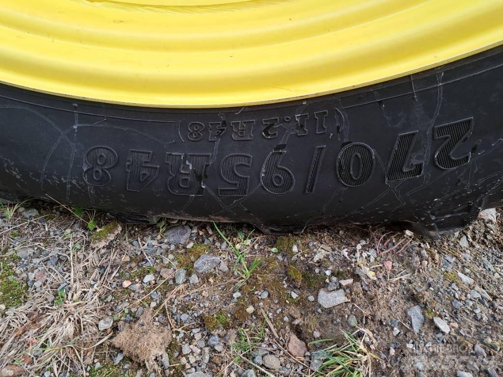 John Deere 740 i Haagispritsid