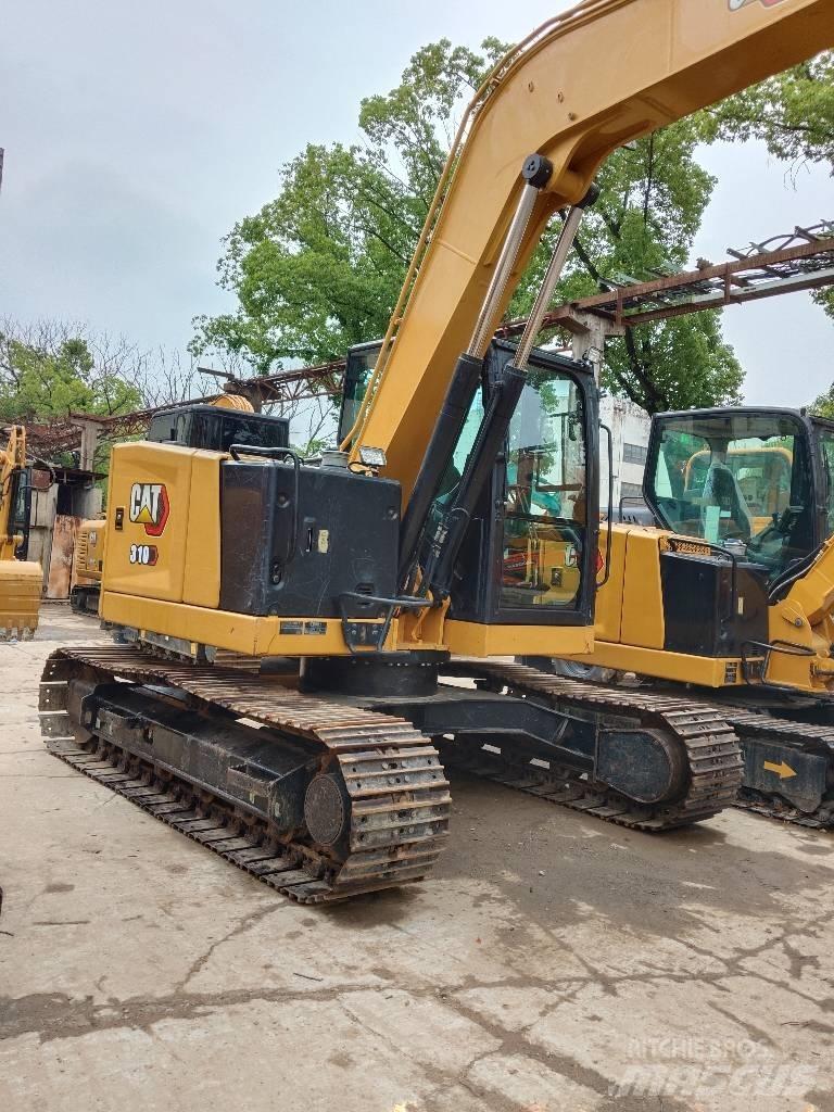 CAT 310 Roomikekskavaatorid