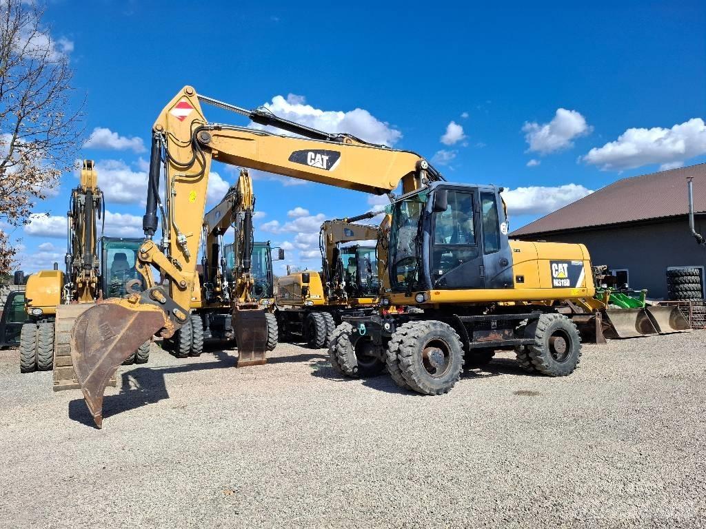 CAT 318 Ratasekskavaatorid