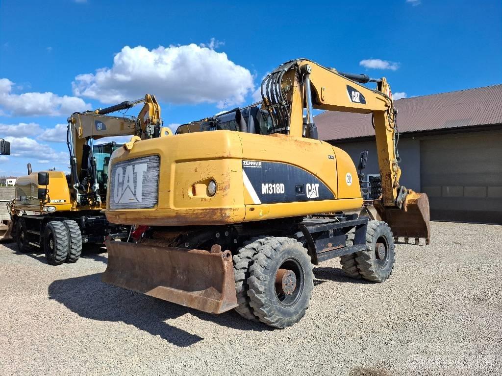 CAT 318 Ratasekskavaatorid