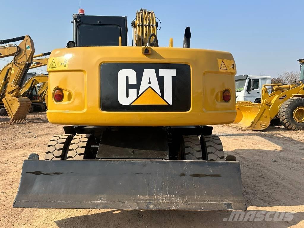 CAT M 320D Ratasekskavaatorid