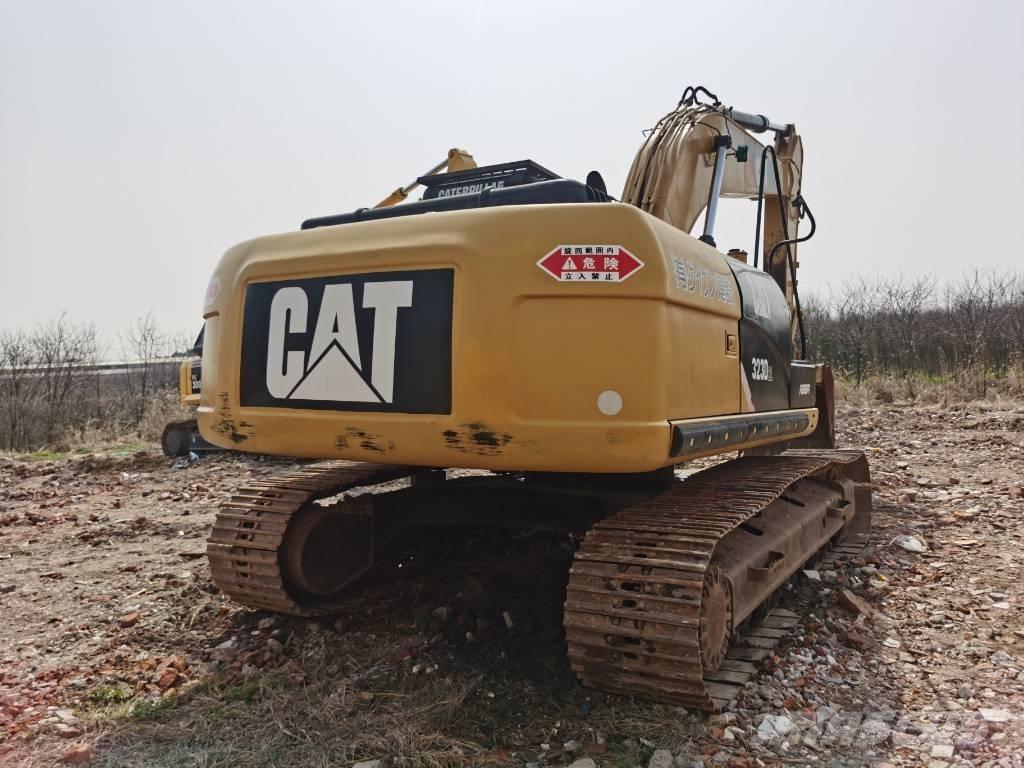 CAT 323 D L Roomikekskavaatorid