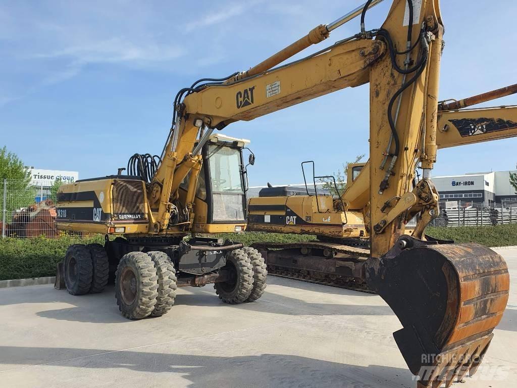 CAT M 318 Ratasekskavaatorid