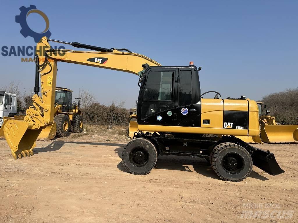 CAT M 320 D2 Ratasekskavaatorid