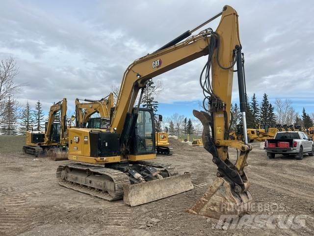 CAT 310 Roomikekskavaatorid