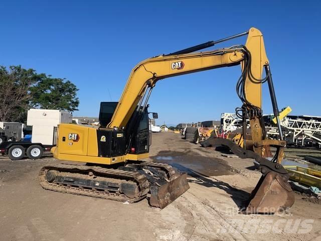 CAT 310 Roomikekskavaatorid
