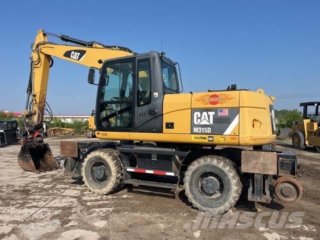 CAT M315D Ratasekskavaatorid