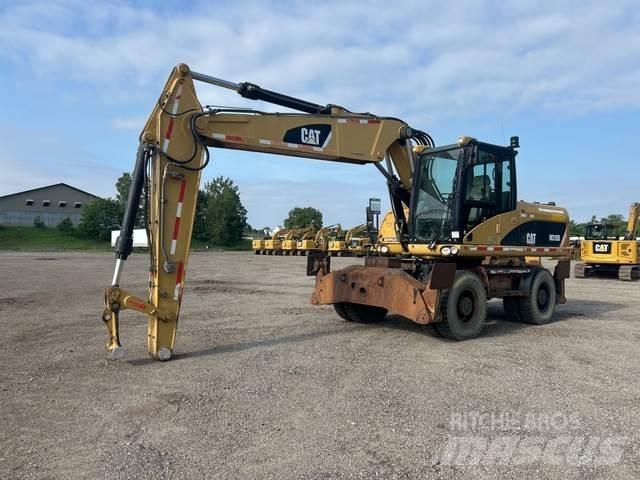CAT M318D Ratasekskavaatorid