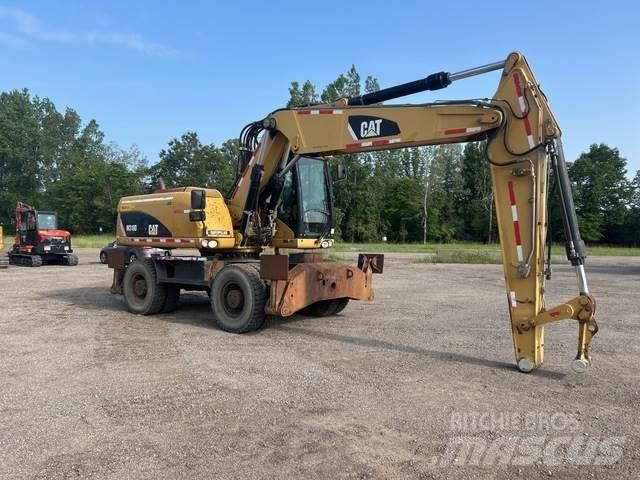 CAT M318D Ratasekskavaatorid