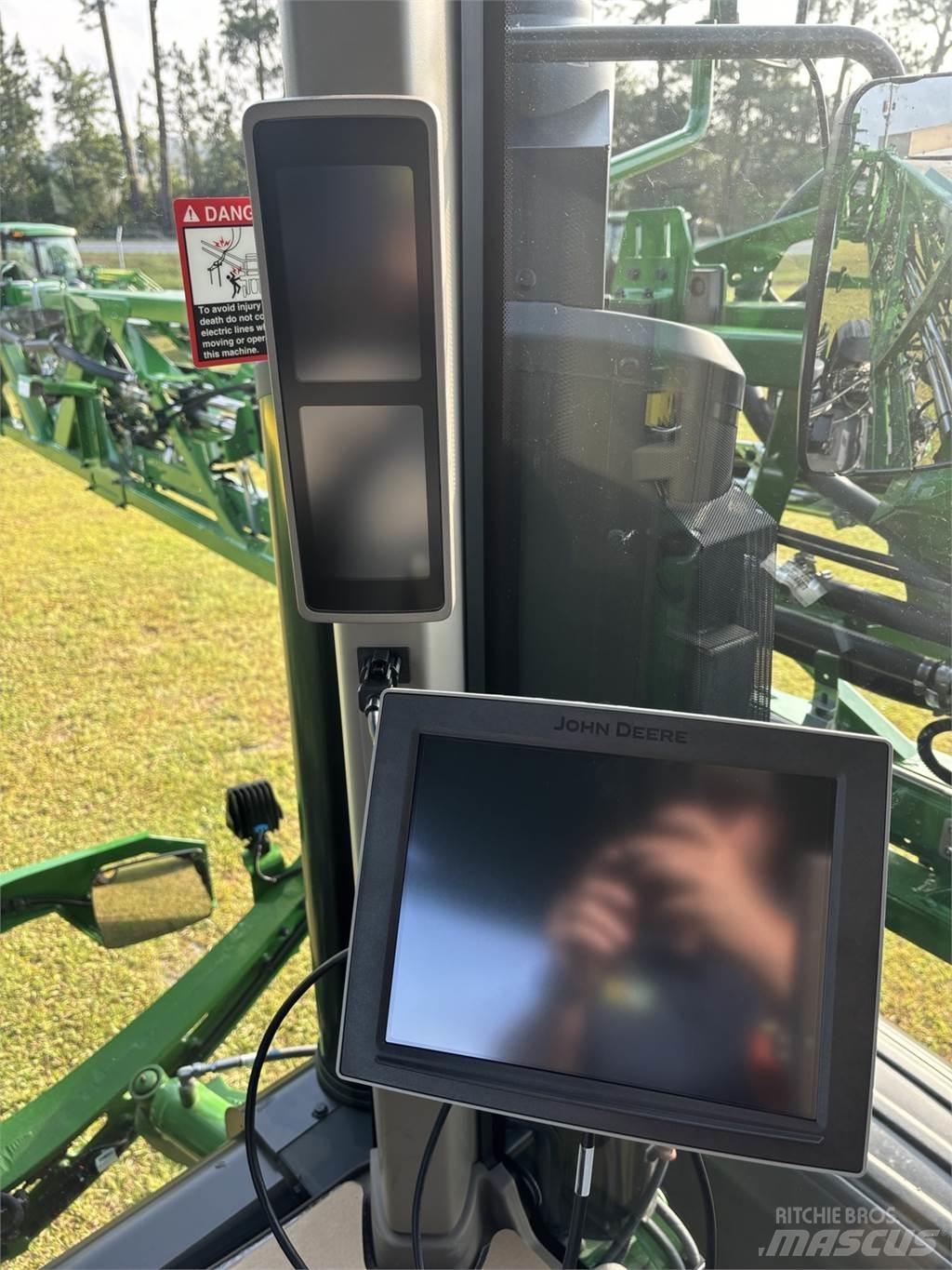 John Deere 410R Haagispritsid