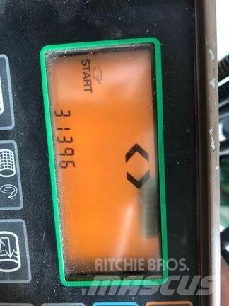 John Deere 590 Ruloonpressid