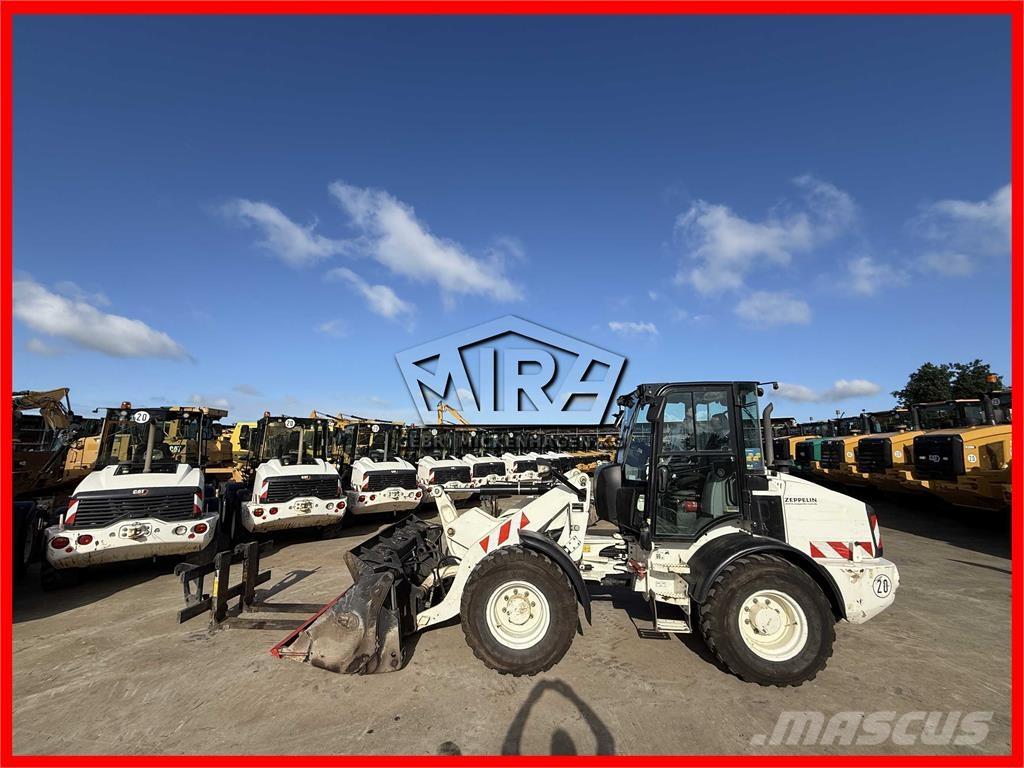 CAT 908M Rataslaadurid