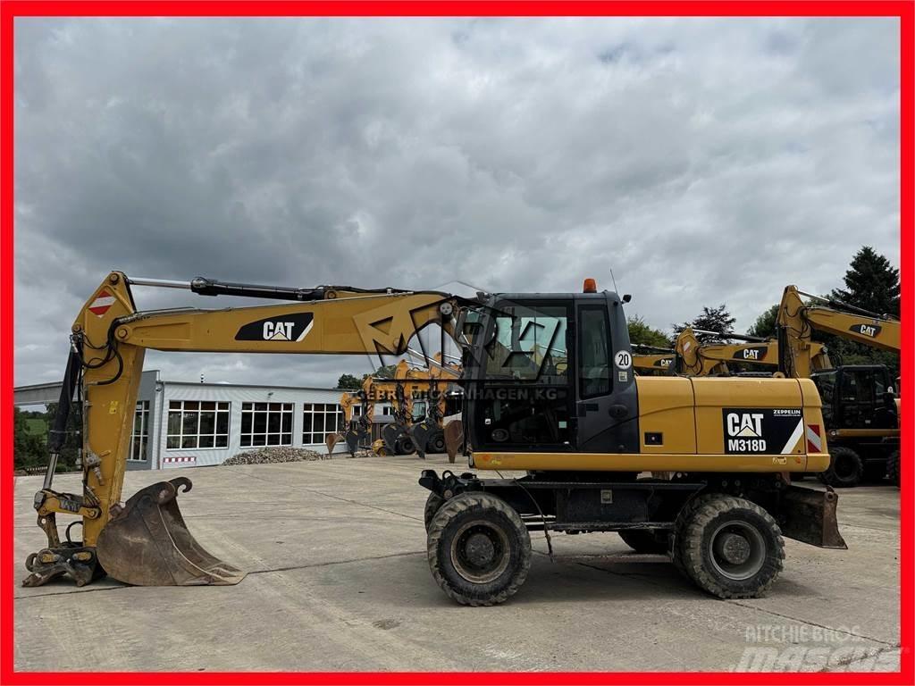 CAT M 318 D Ratasekskavaatorid