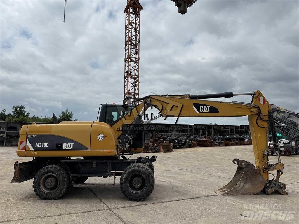 CAT M 318 D Ratasekskavaatorid