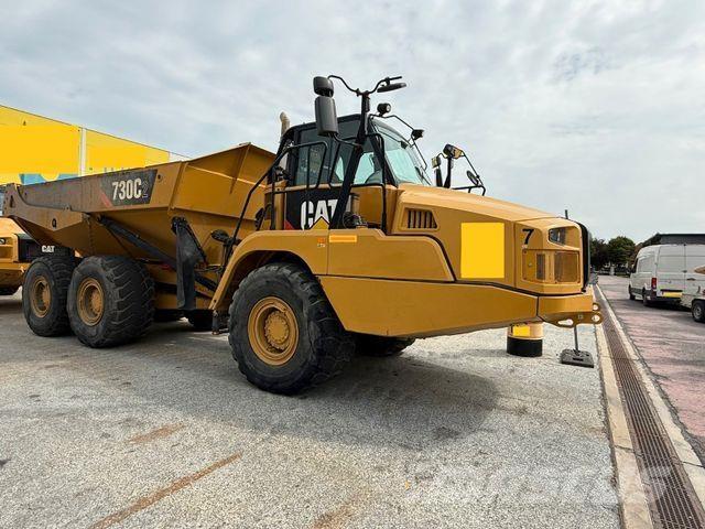 CAT Dumper 730 C2 Liigendraamiga pinnaseveokid
