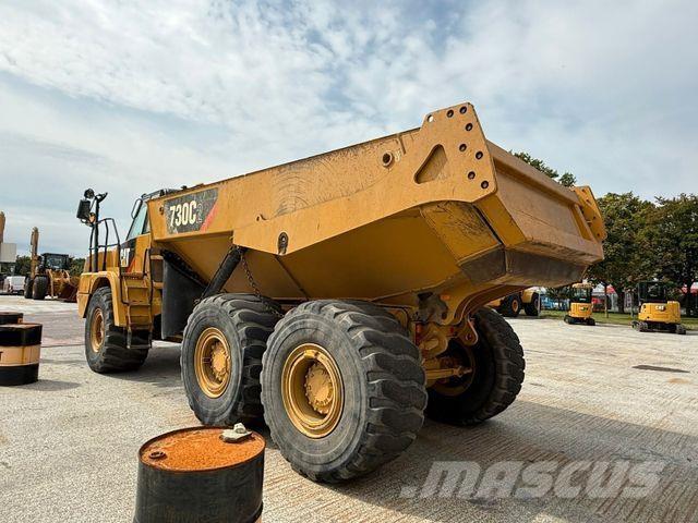 CAT Dumper 730 C2 Liigendraamiga pinnaseveokid