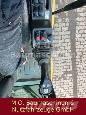 CAT MH 3022 Ratasekskavaatorid