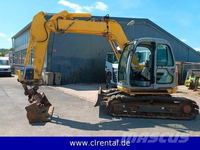 New Holland E70SR 4 Ekskavaatorlaadurid